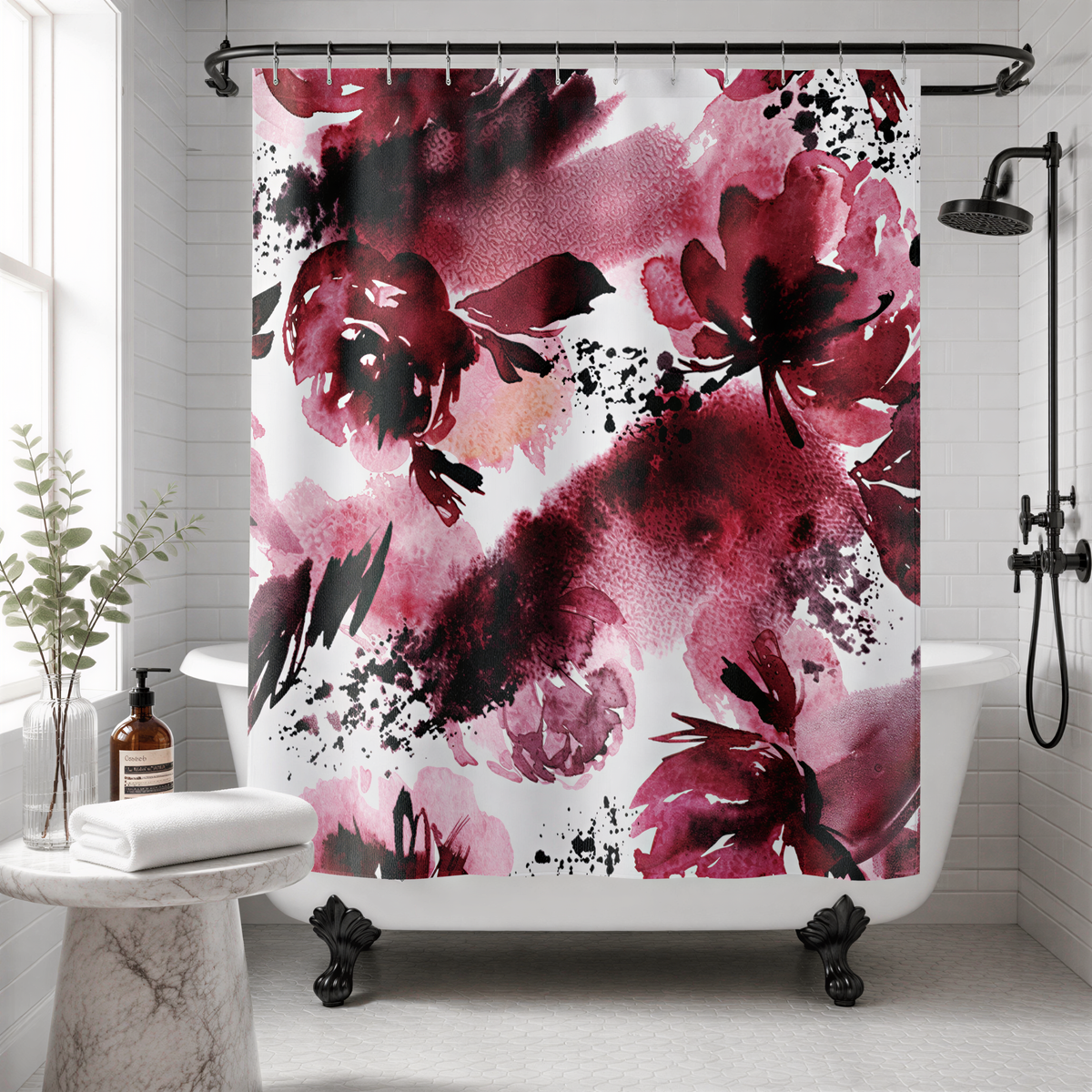 a bathroom with a white bathtub, a shower curtain with a floral print in shades of pink and black, and a potted plant on a side table.