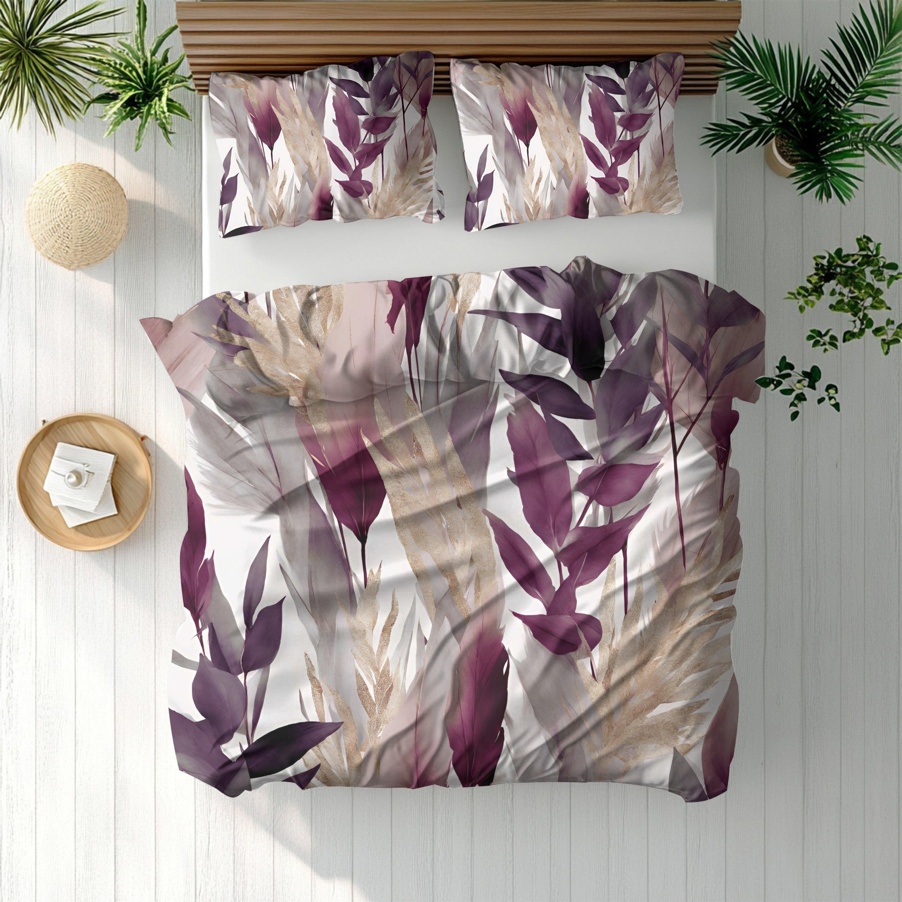 a bed with a white and purple floral print duvet cover and matching pillows, along with a wooden headboard. The bed is set against a backdrop of potted plants and a wooden floor, creating a cozy and natural atmosphere.