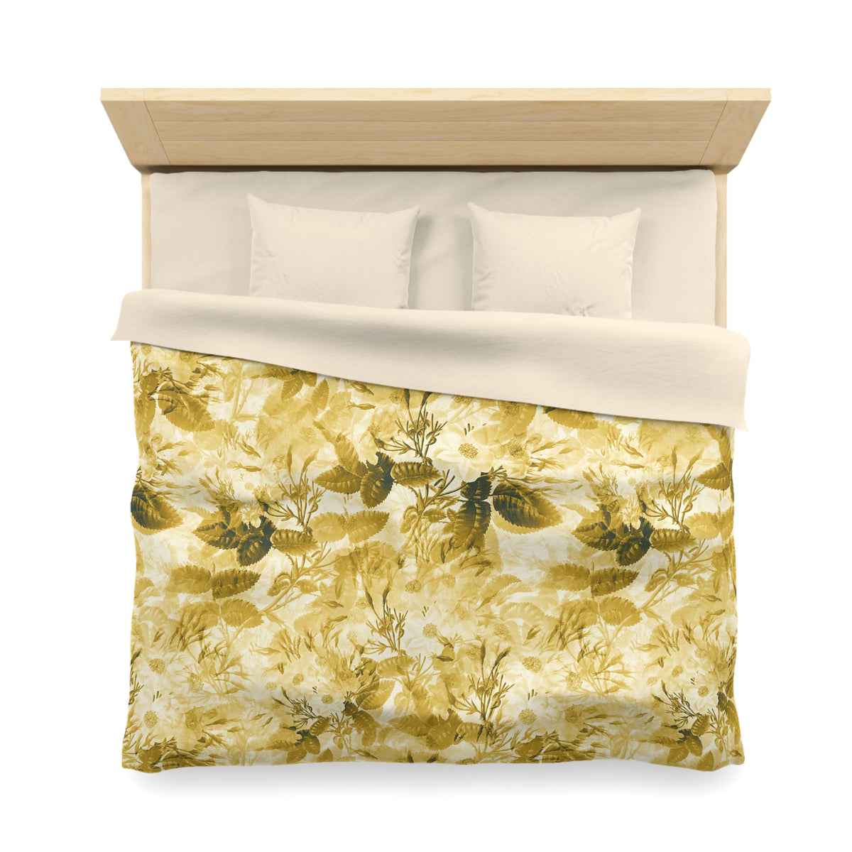 a neatly made bed with a yellow and green floral patterned comforter and pillows.