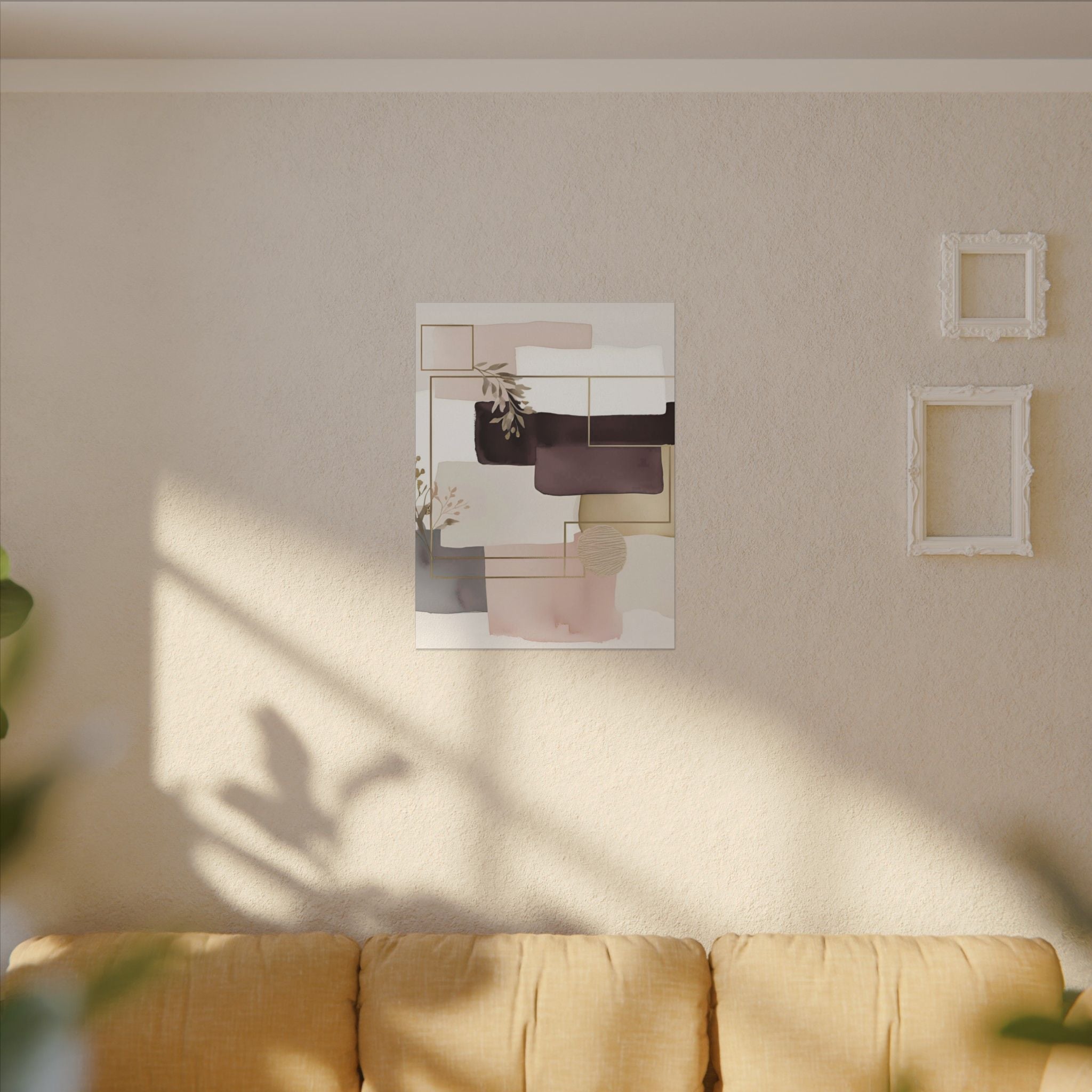 a living room with a beige sofa and a framed abstract art piece hanging on the wall above it.