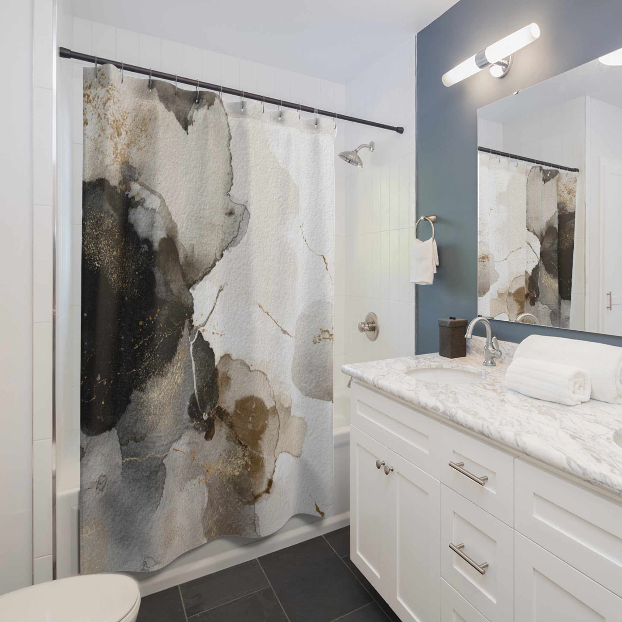 a modern bathroom with a white vanity, a shower curtain featuring a abstract design, and a mirror above the vanity.