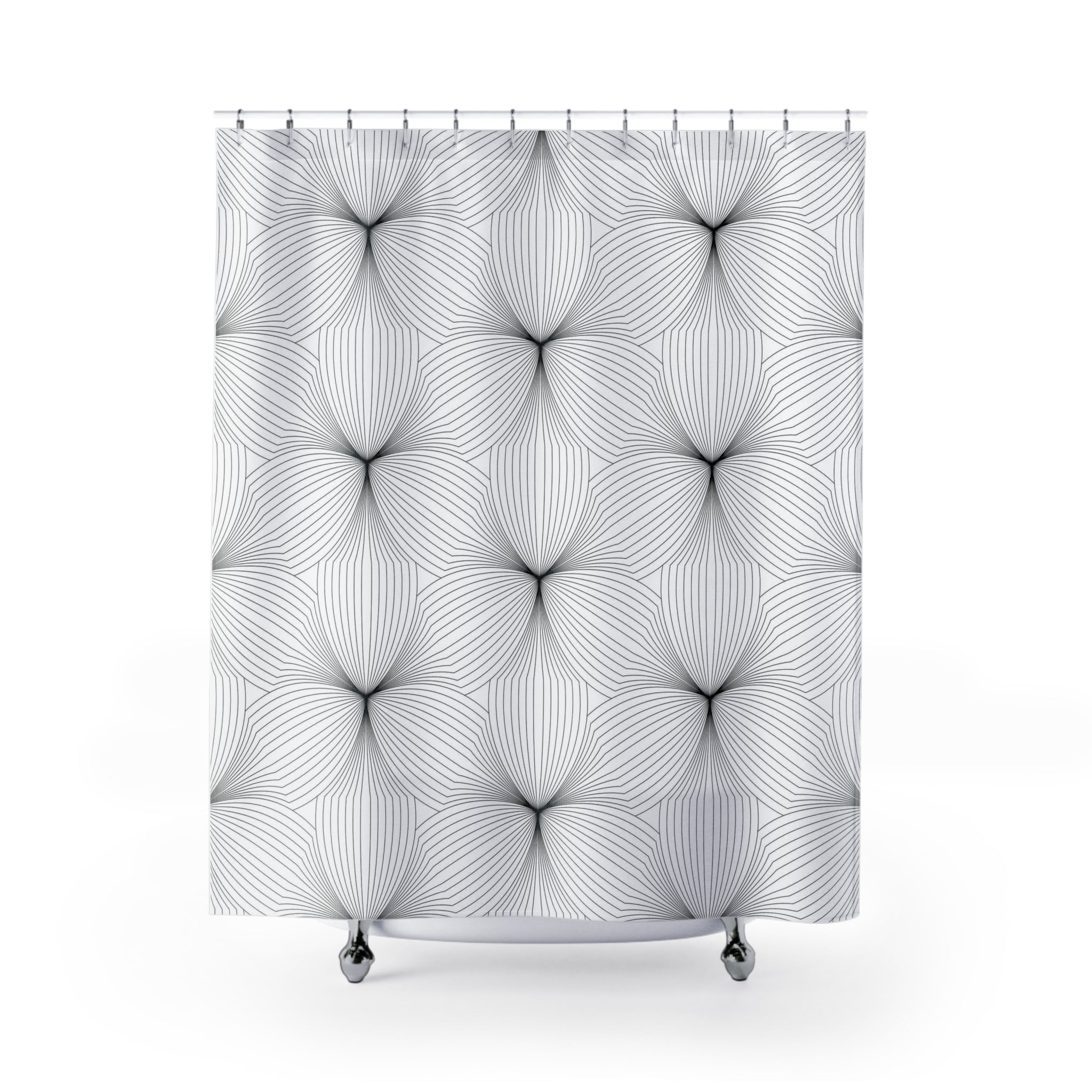 a white shower curtain with a circular pattern