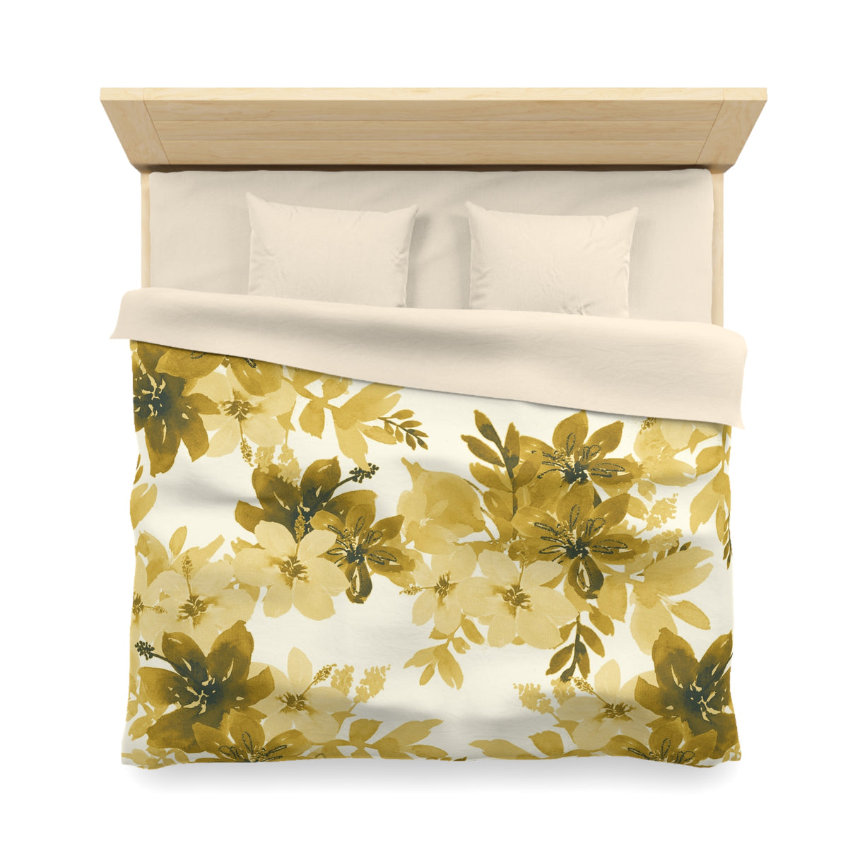 a bed with a floral print duvet cover and pillows.