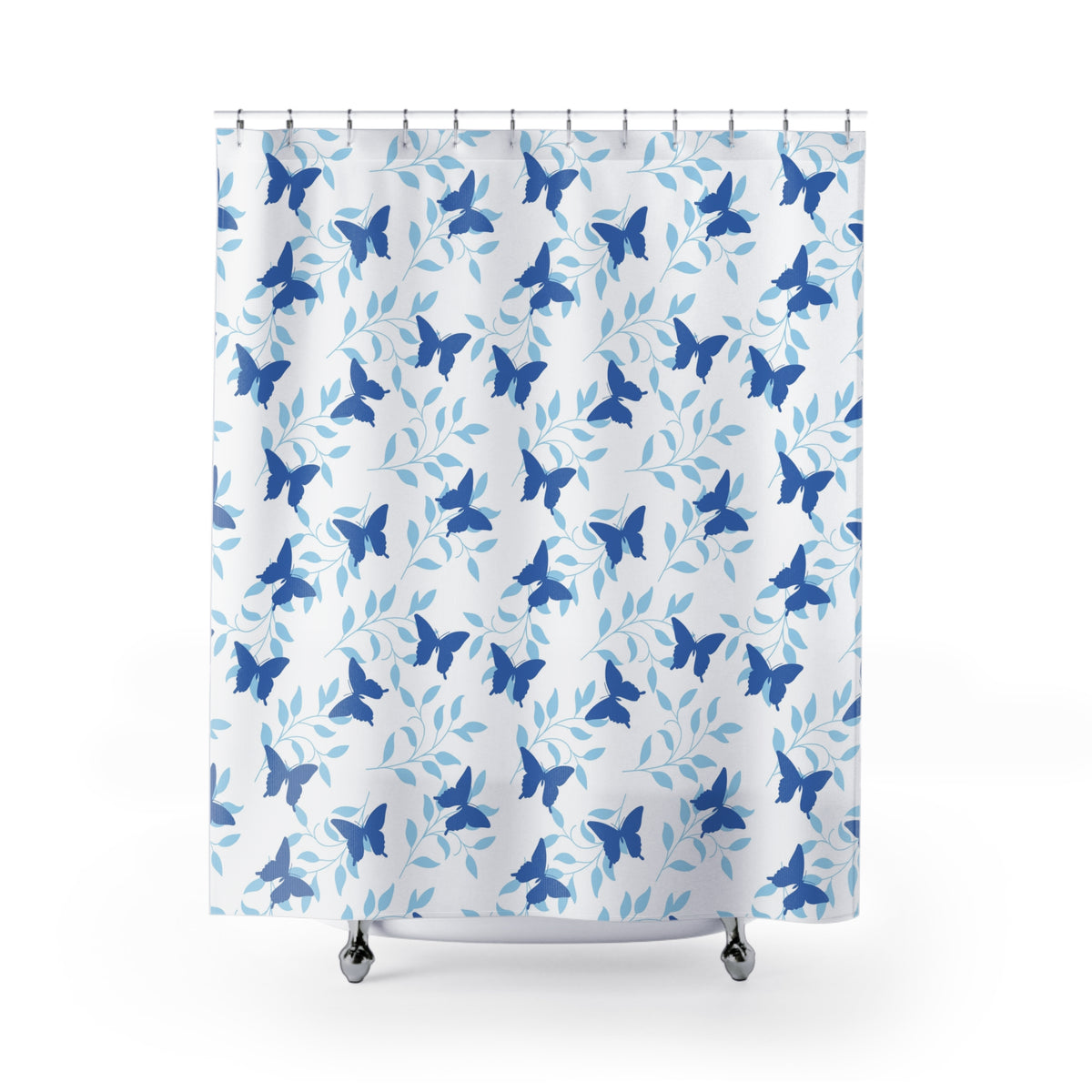a shower curtain with a repeating pattern of blue butterflies and green leaves.