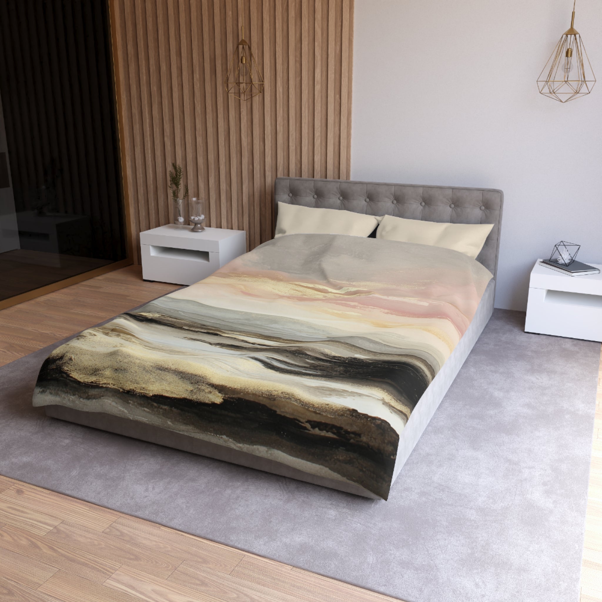 a modern bedroom with a large bed, a gray headboard, and a colorful abstract patterned bedspread. The room has a neutral color scheme with white walls and a gray carpet. There are also two nightstands and a pendant light hanging above the bed.
