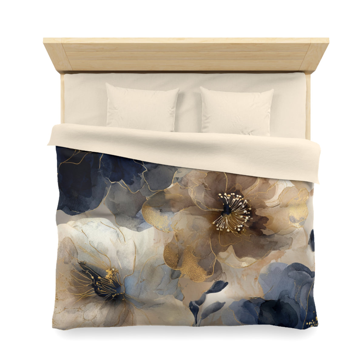 a bed with a floral print duvet cover featuring a combination of blue, white, and gold colors.