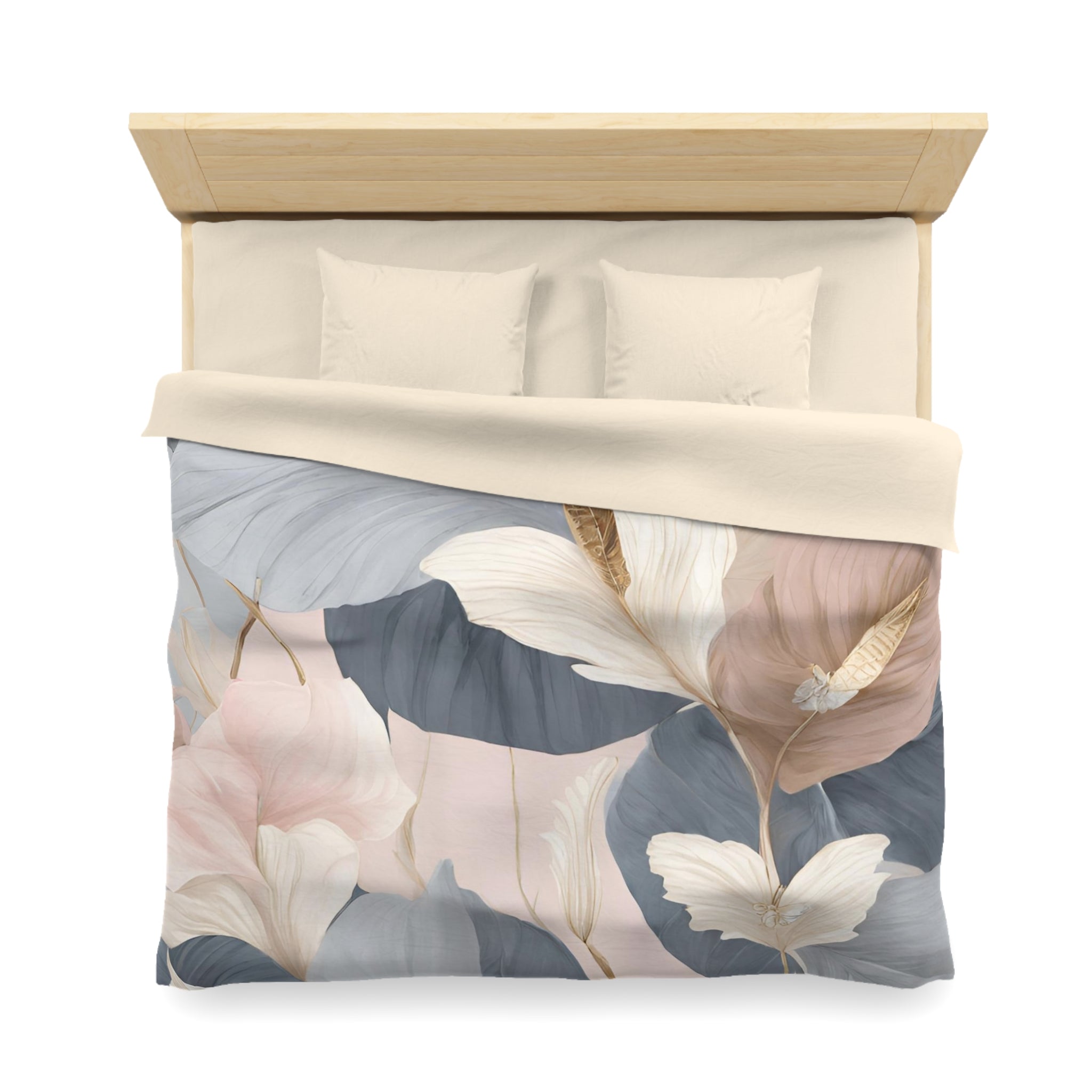 a bed with a floral print duvet cover and pillows.