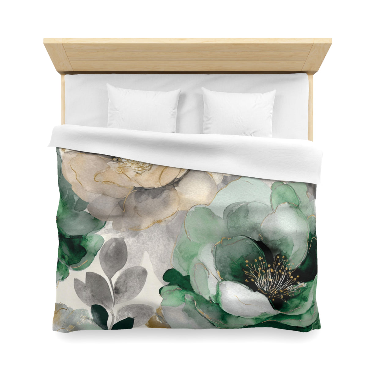 a bed with a floral print duvet cover featuring a combination of green and gray colors, along with gold accents.