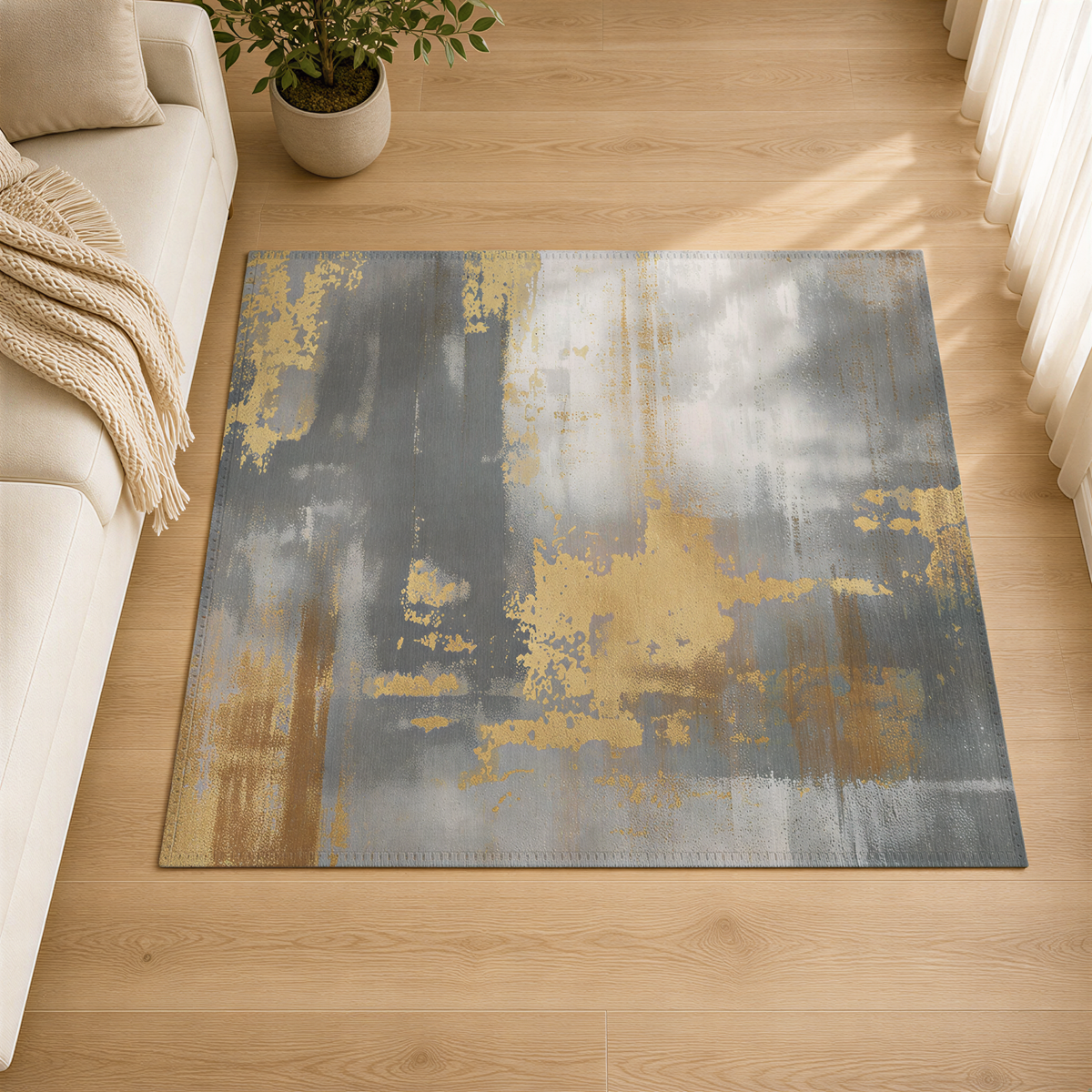 a large abstract rug with a mix of gray, yellow, and white colors, placed on a wooden floor in a living room setting.
