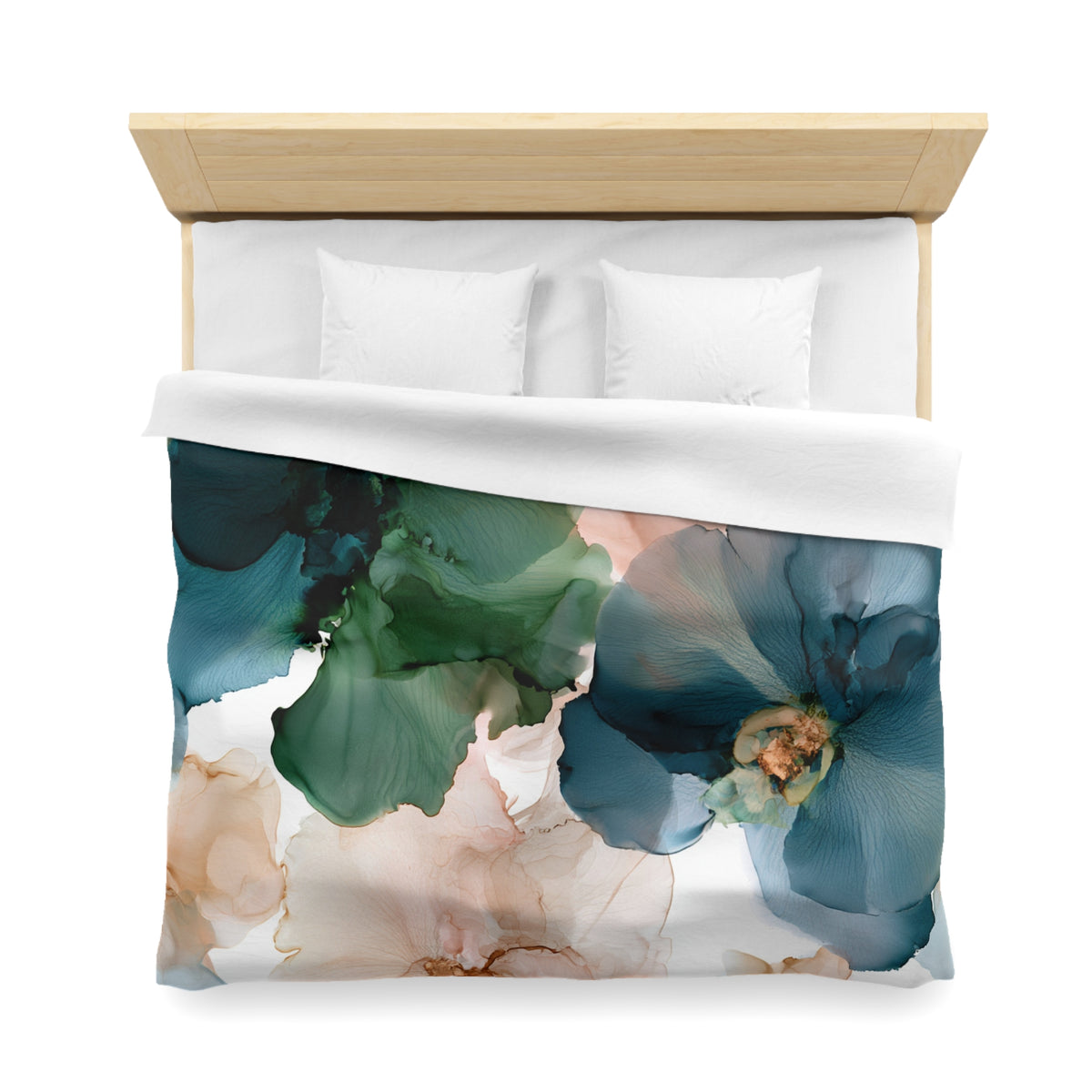 a bed with a blue and pink flower on it