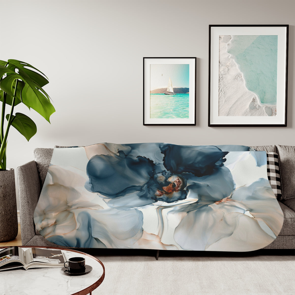 a living room with a couch covered in a blanket