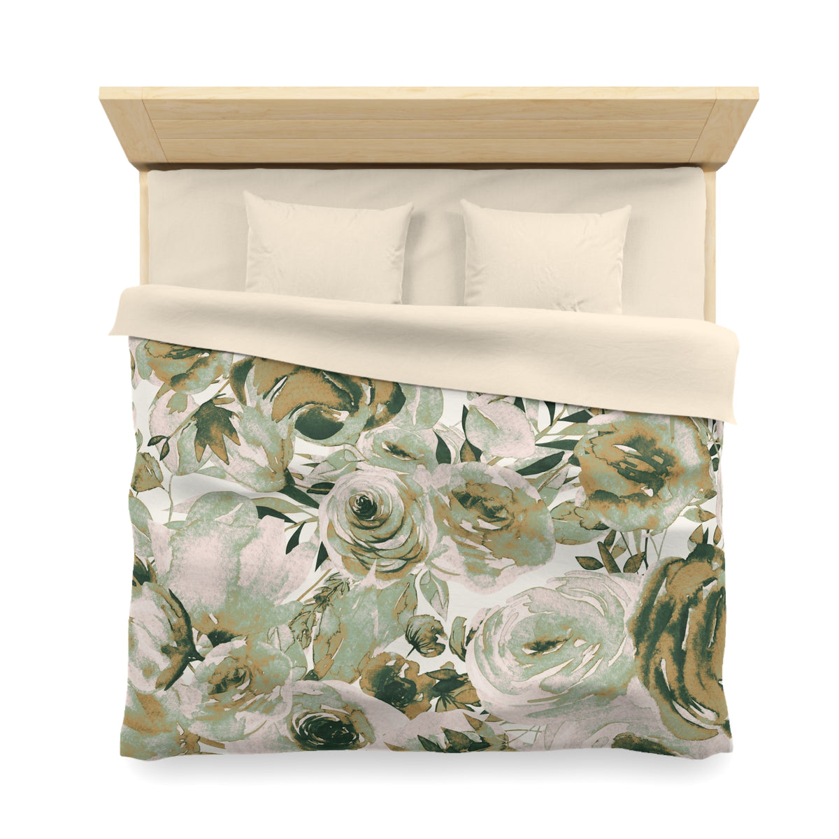 a bed with a floral print duvet cover and pillows.
