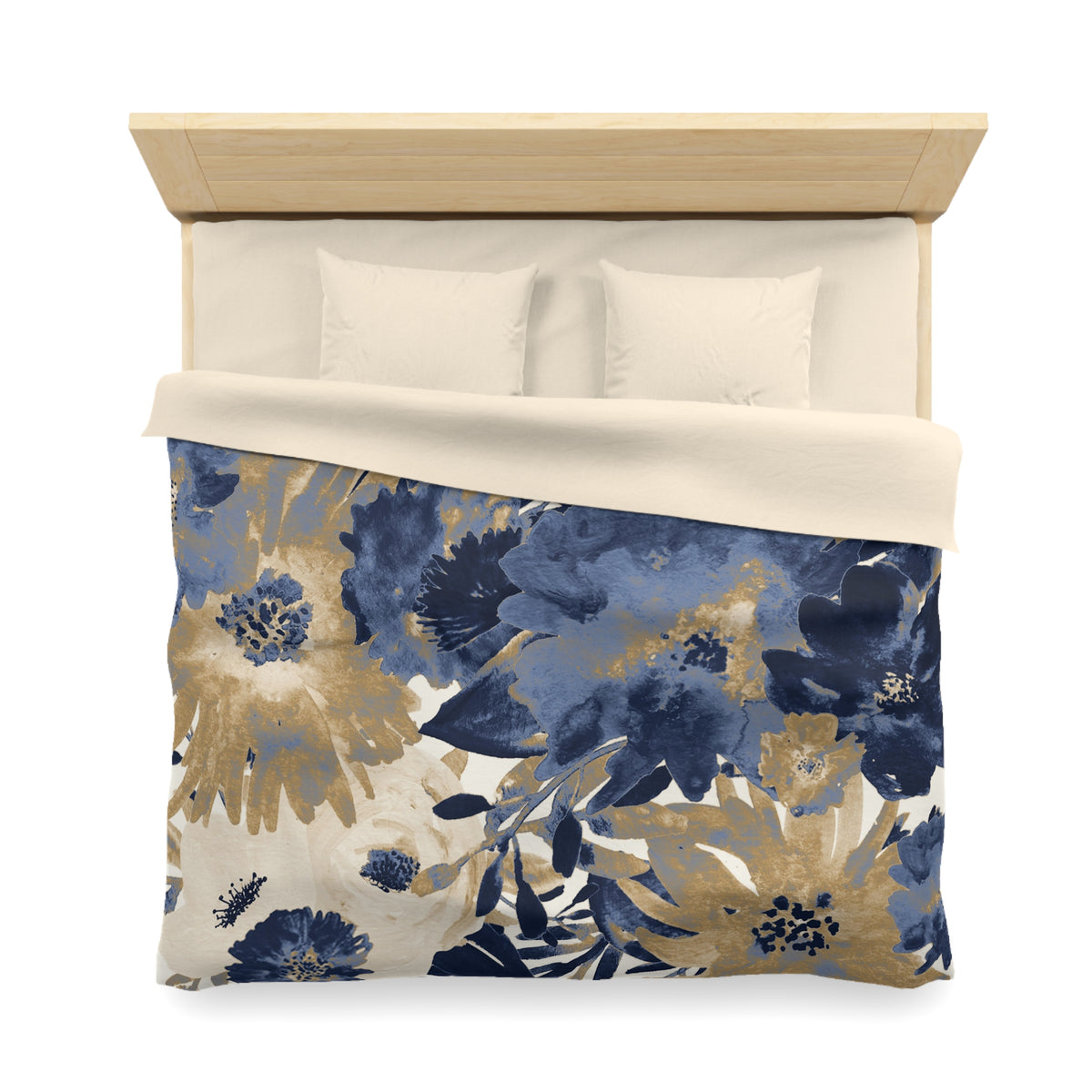 a neatly made bed with a floral print duvet cover and two white pillows.