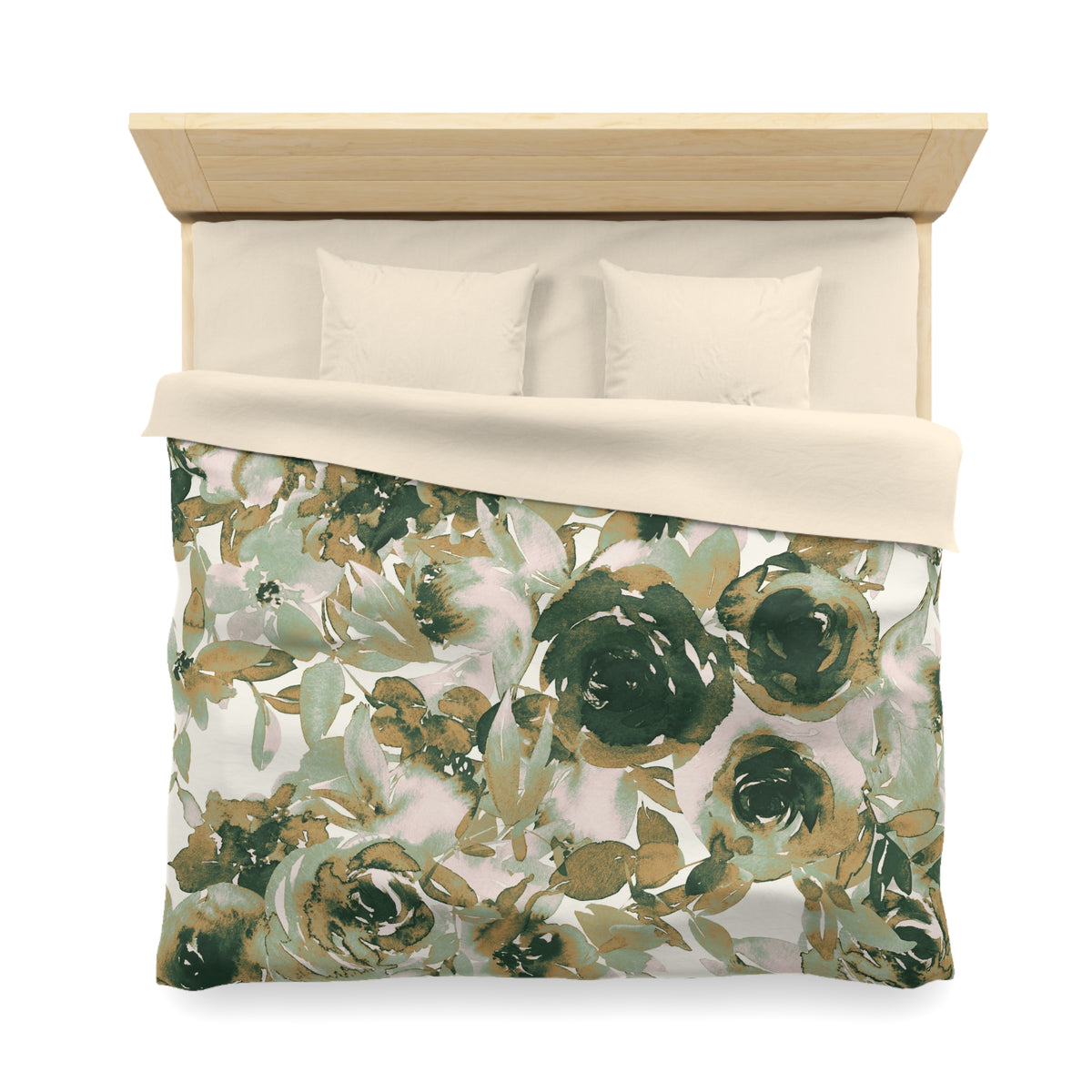 a neatly made bed with a floral print comforter and pillows.