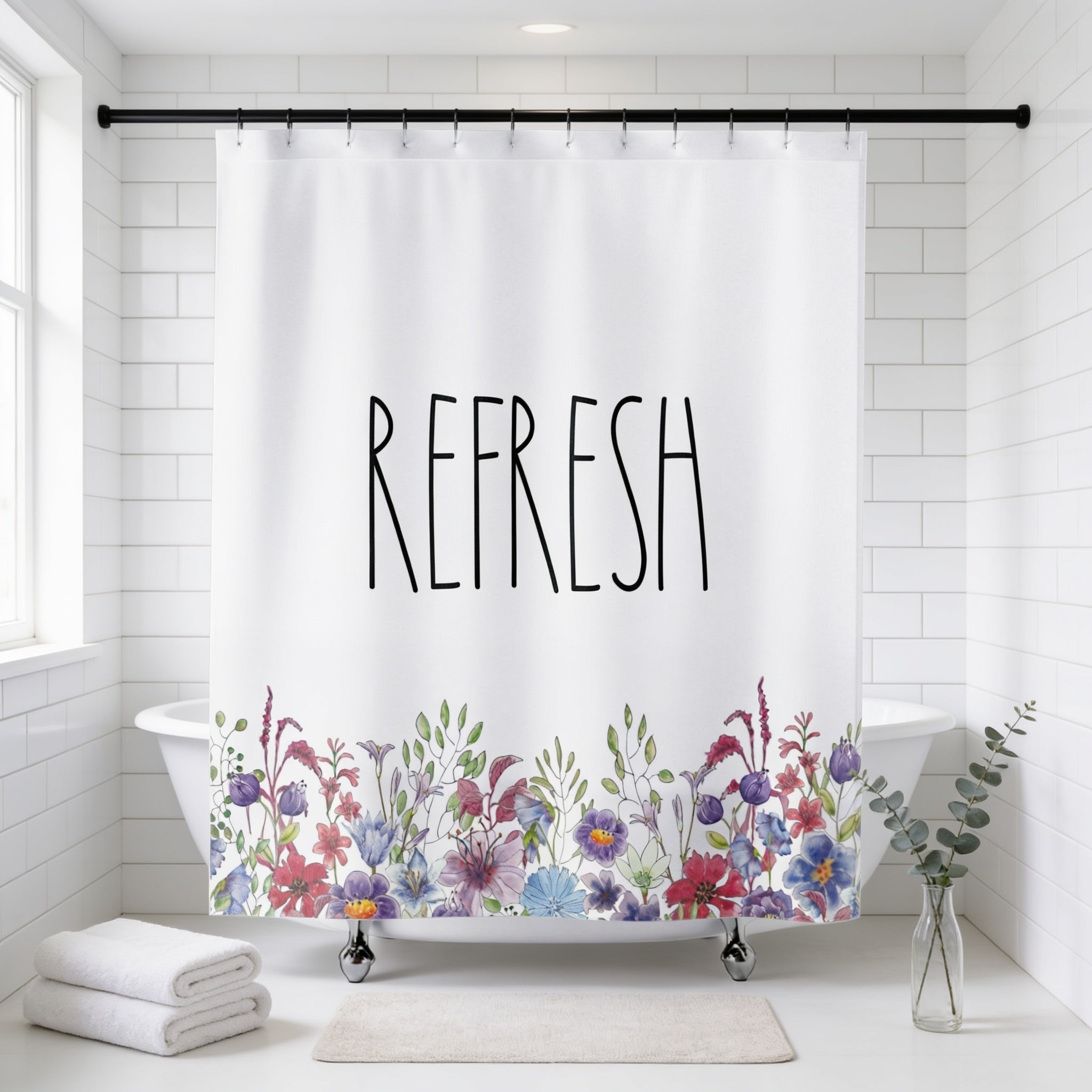a bathroom with a white bathtub, a shower curtain with a floral design, and a potted plant on the floor.