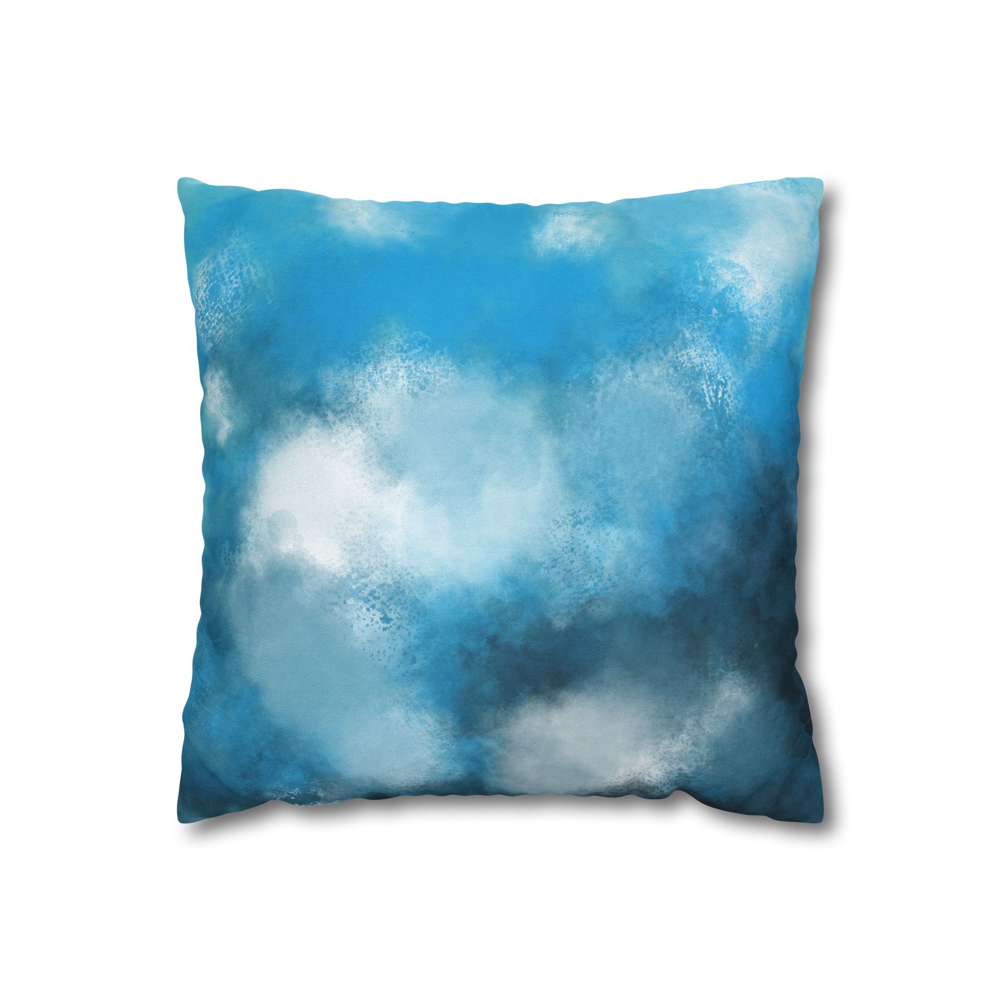 A square throw pillow with a blue and white cloud-like pattern.