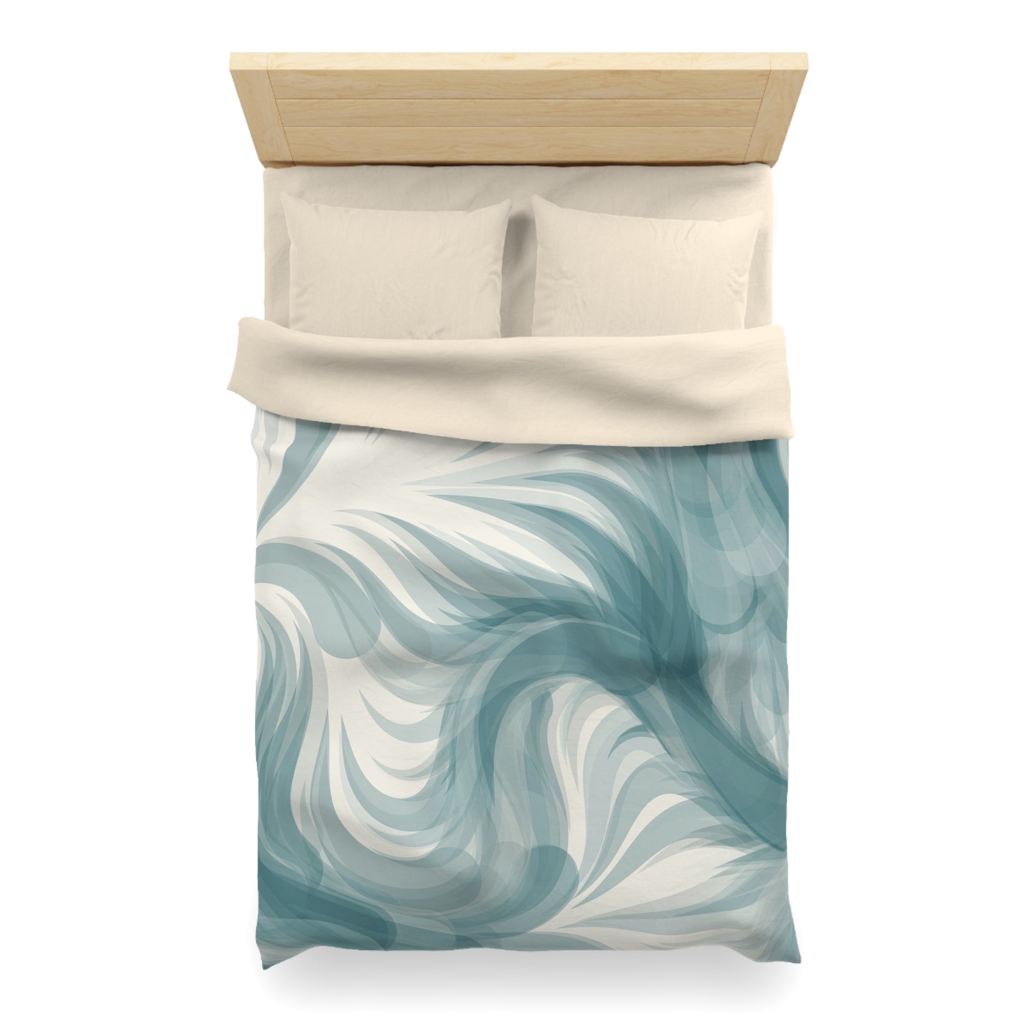 a neatly made bed with a blue and white patterned comforter and pillows.
