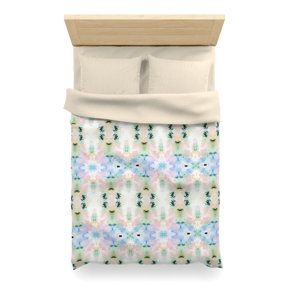 a neatly made bed with a colorful, patterned comforter and pillows.
