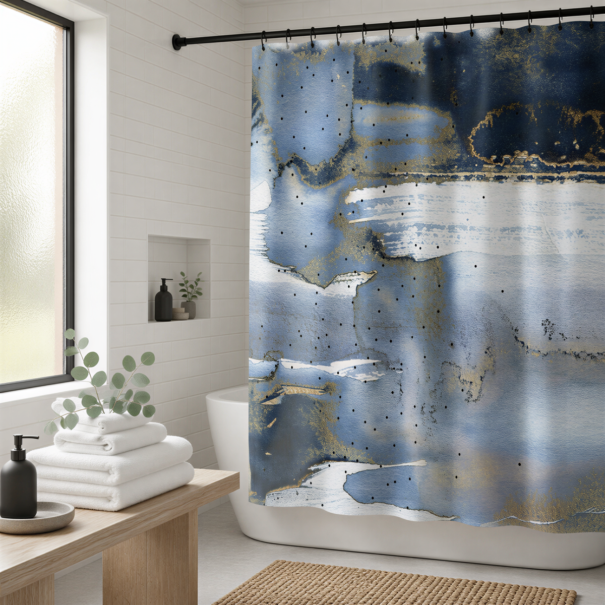 a bathroom with a blue and white abstract shower curtain featuring a watercolor-like texture. The shower curtain is hanging from a rod, and there is a window in the background. The bathroom also includes a wooden bench, a white toilet, and a small plant.