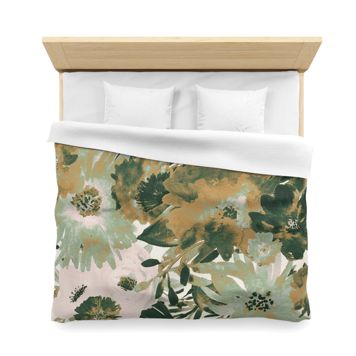 a bed with a floral print duvet cover and white pillows.