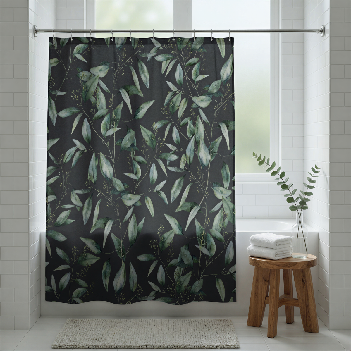 a bathroom with a shower curtain adorned with a leafy green pattern. The curtain is hanging from a rod, and there is a wooden stool placed next to it. A small plant is also present in the scene, adding a touch of greenery to the space.