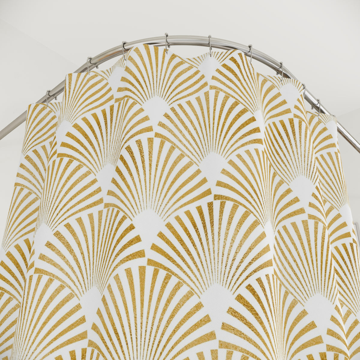 a shower curtain with a repeating pattern of gold and white stripes, resembling a fan or a decorative design.