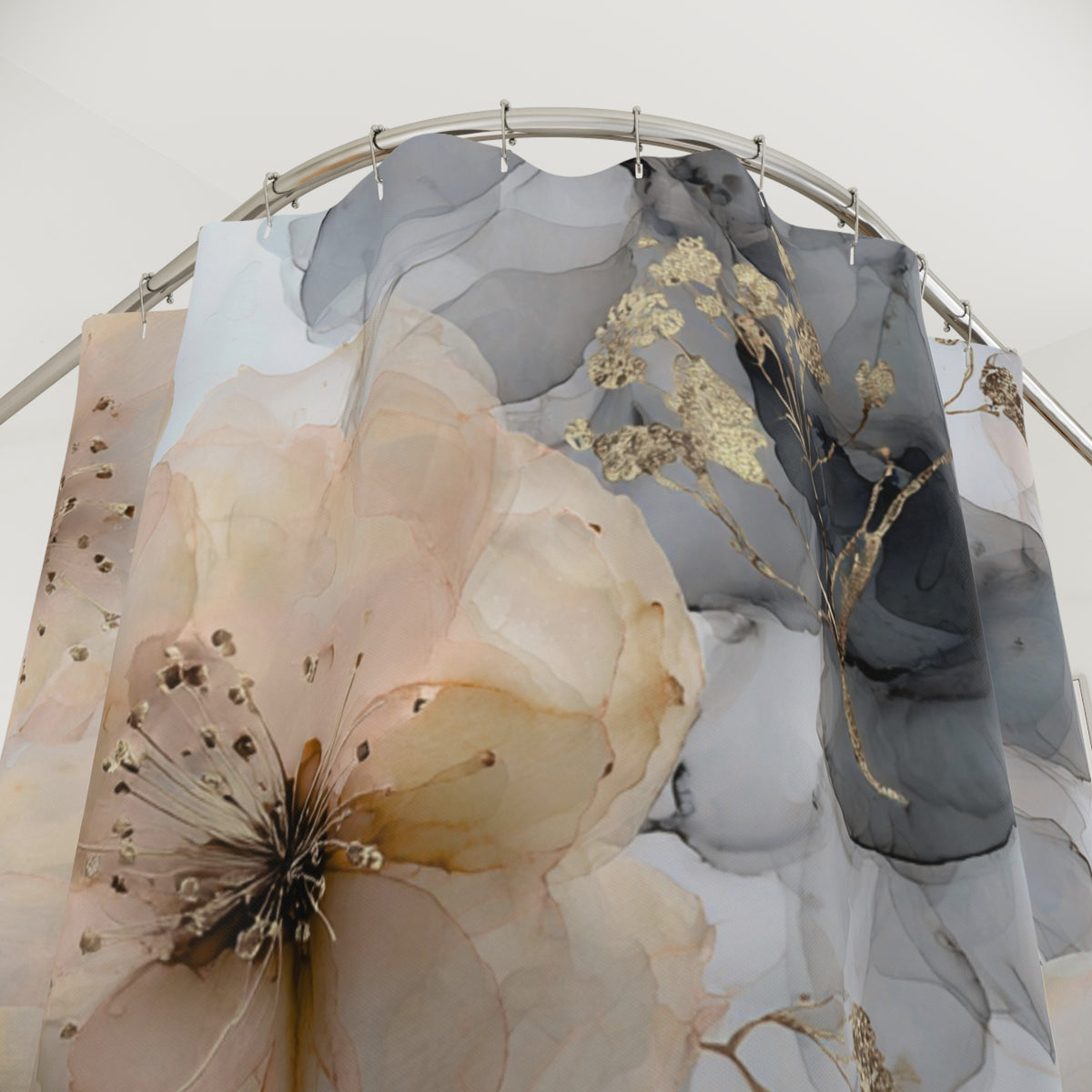 a shower curtain with a floral design, including a large pink flower and a smaller black flower with gold accents.