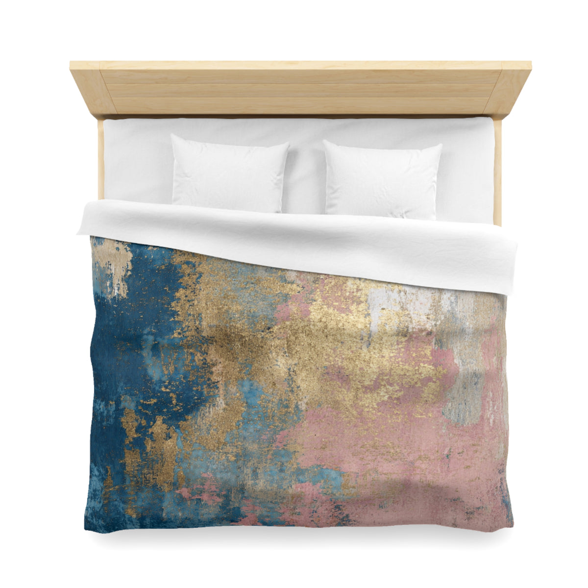 a bed with a colorful, abstract patterned comforter and pillows.
