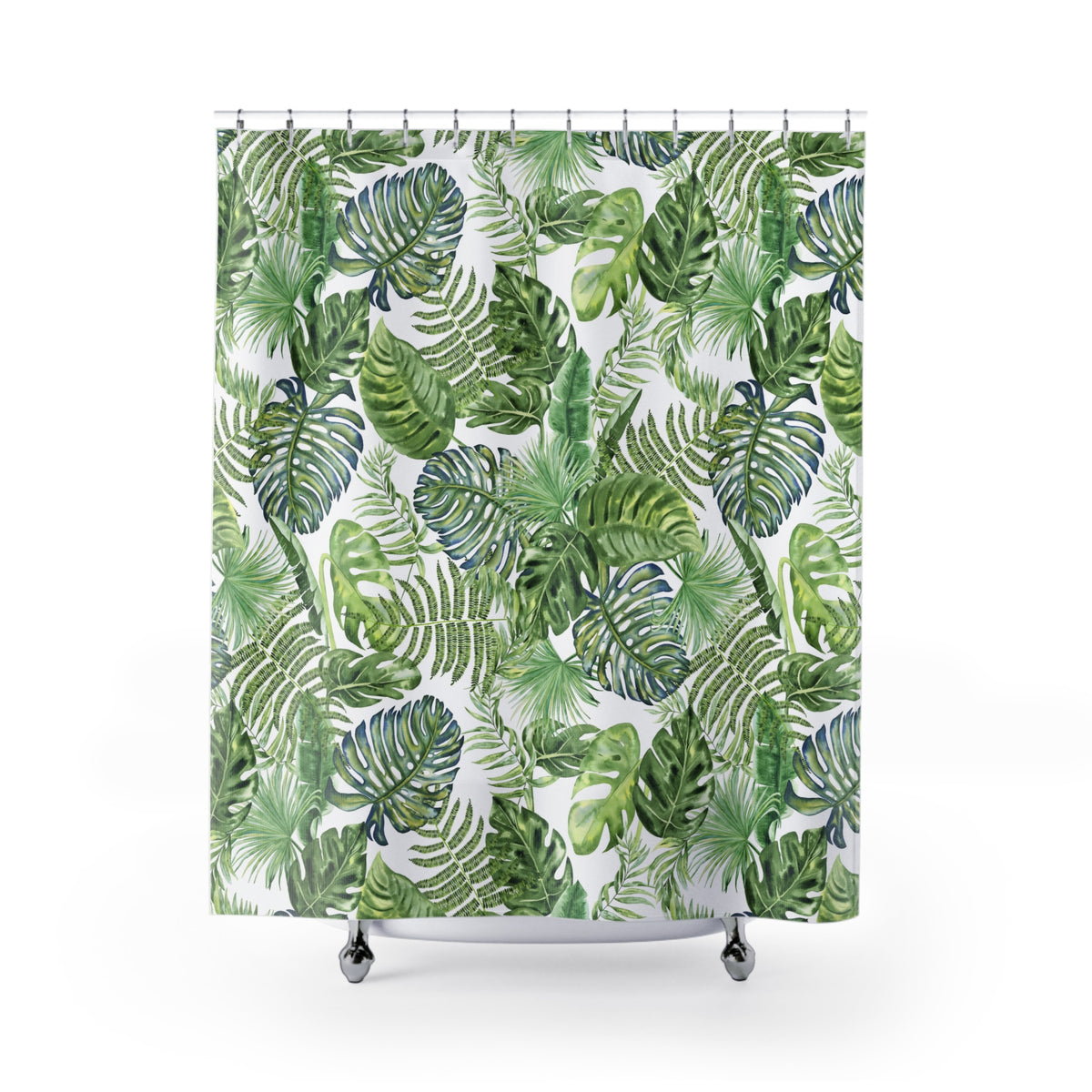a shower curtain with a repeating pattern of green palm leaves and ferns.