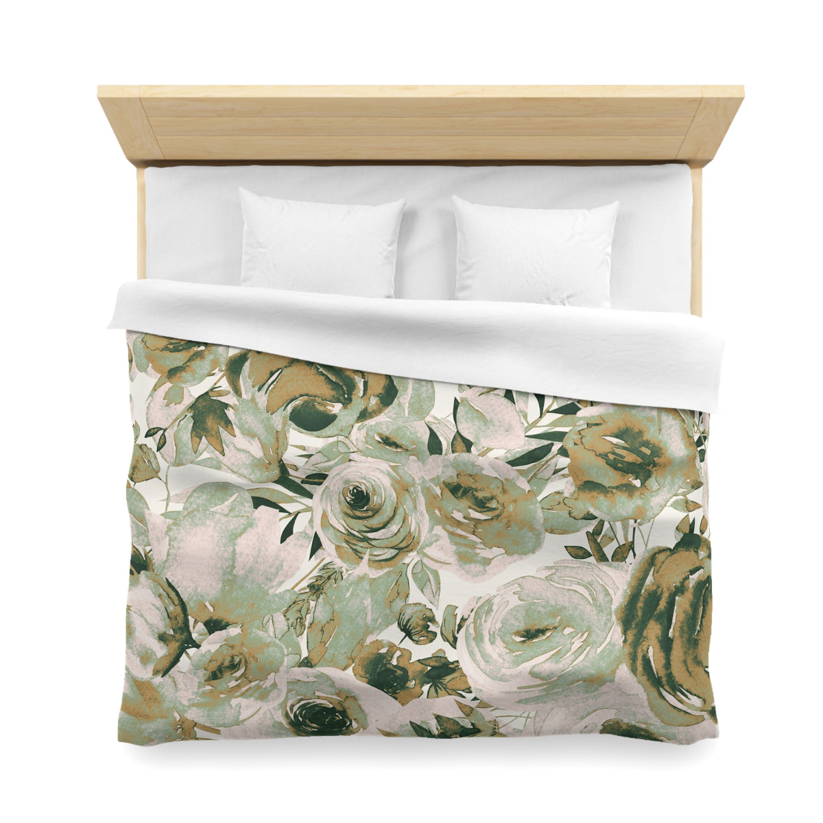 a bed with a floral print duvet cover and white pillows.