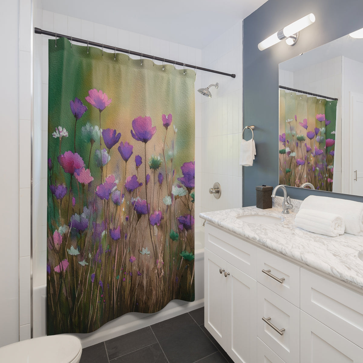 A bathroom with a white vanity and a shower curtain featuring a floral design in shades of green, purple, and pink.