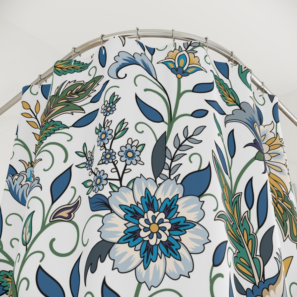 a shower curtain with a floral pattern in shades of blue, green, and yellow.