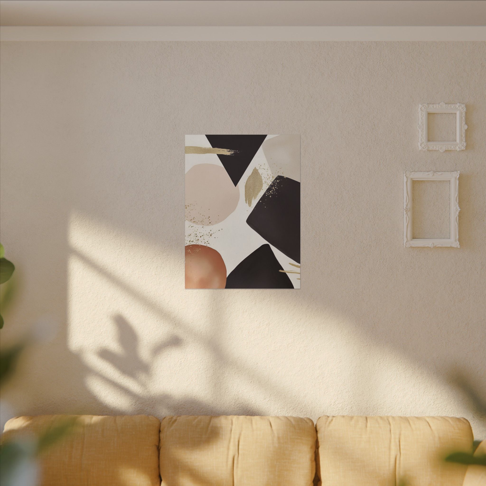 a modern abstract art piece hanging on a wall, with a beige couch in the foreground.