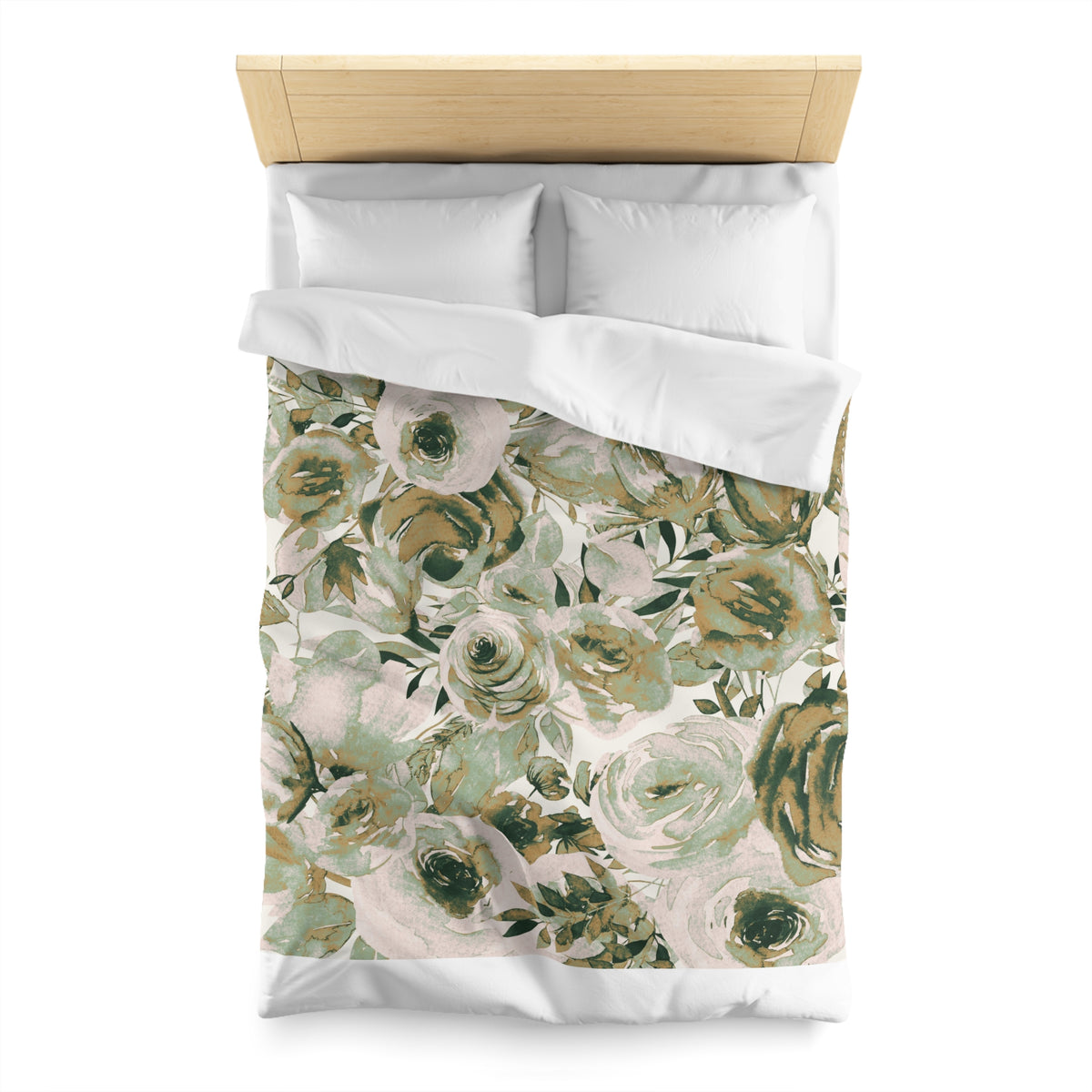 a bed with a floral print duvet cover and pillows.