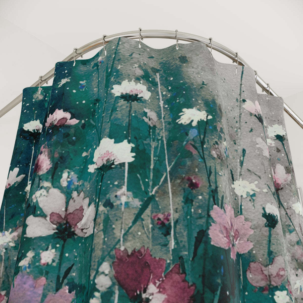 a shower curtain with a floral pattern in shades of green and pink.