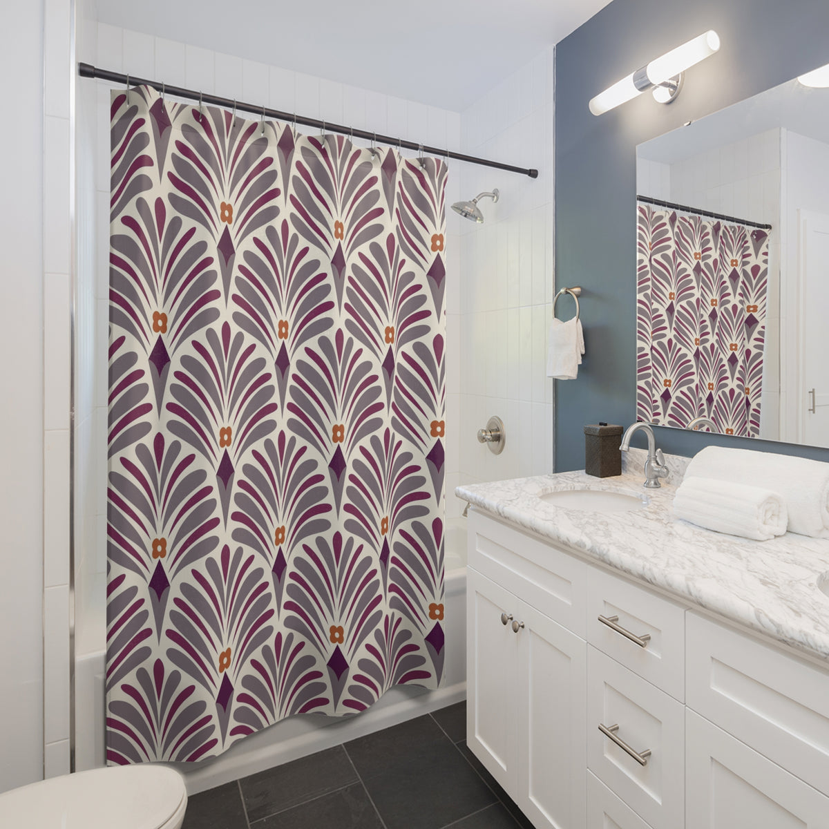 a modern bathroom with a white vanity, a shower curtain with a purple and white floral pattern, and a mirror above the vanity.