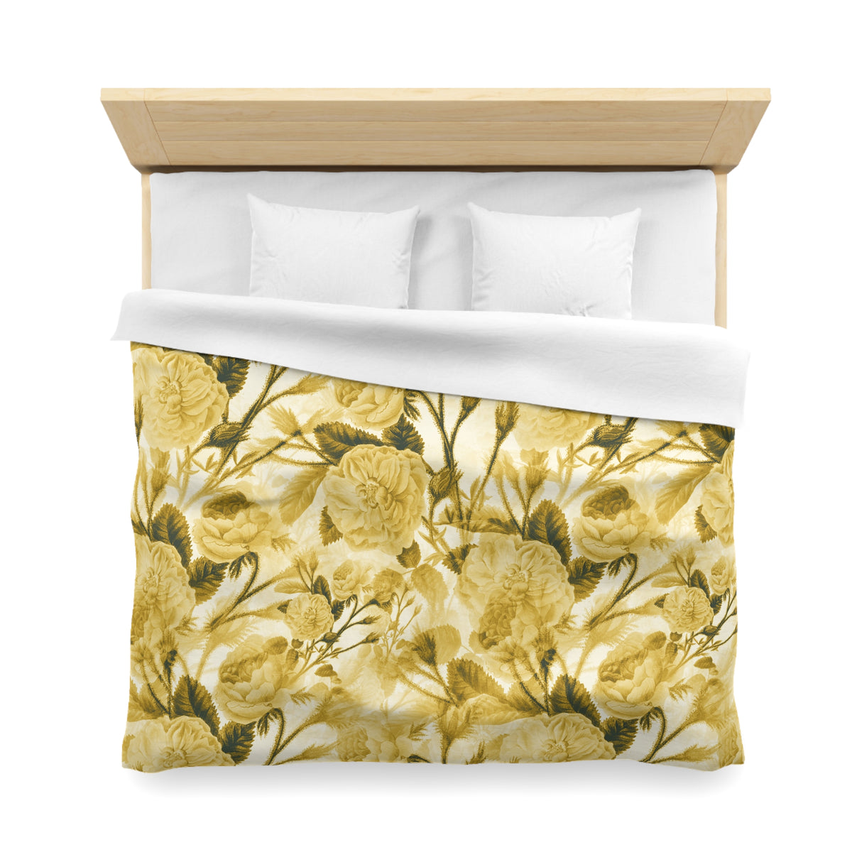 a bed with a floral print duvet cover and white pillows.