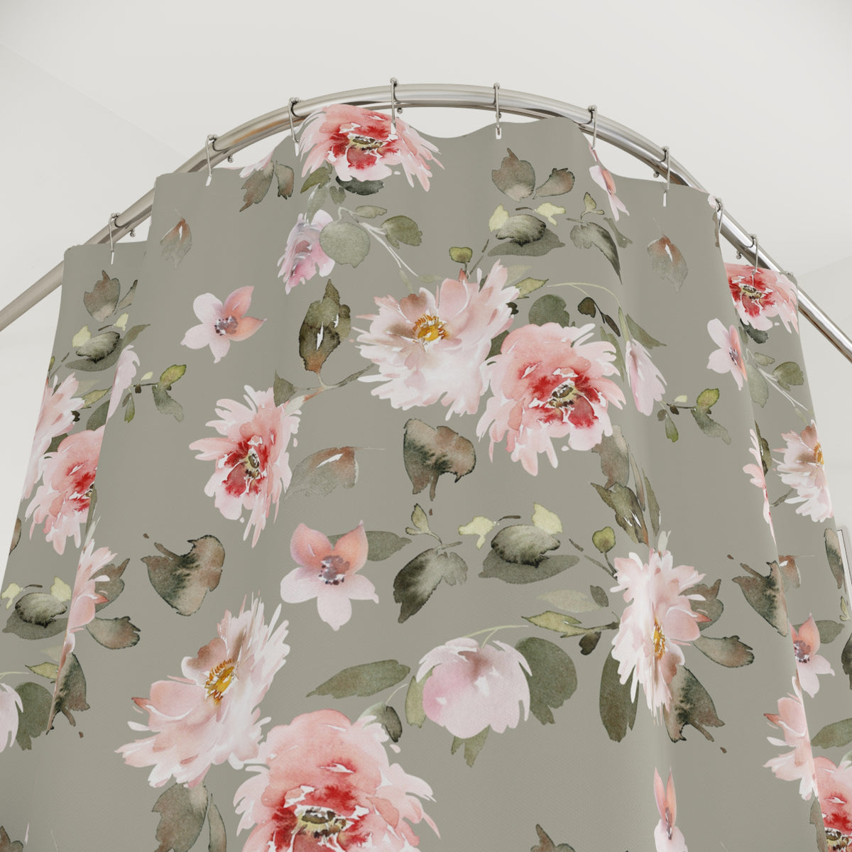 a shower curtain with a floral pattern of pink and white flowers on a gray background.