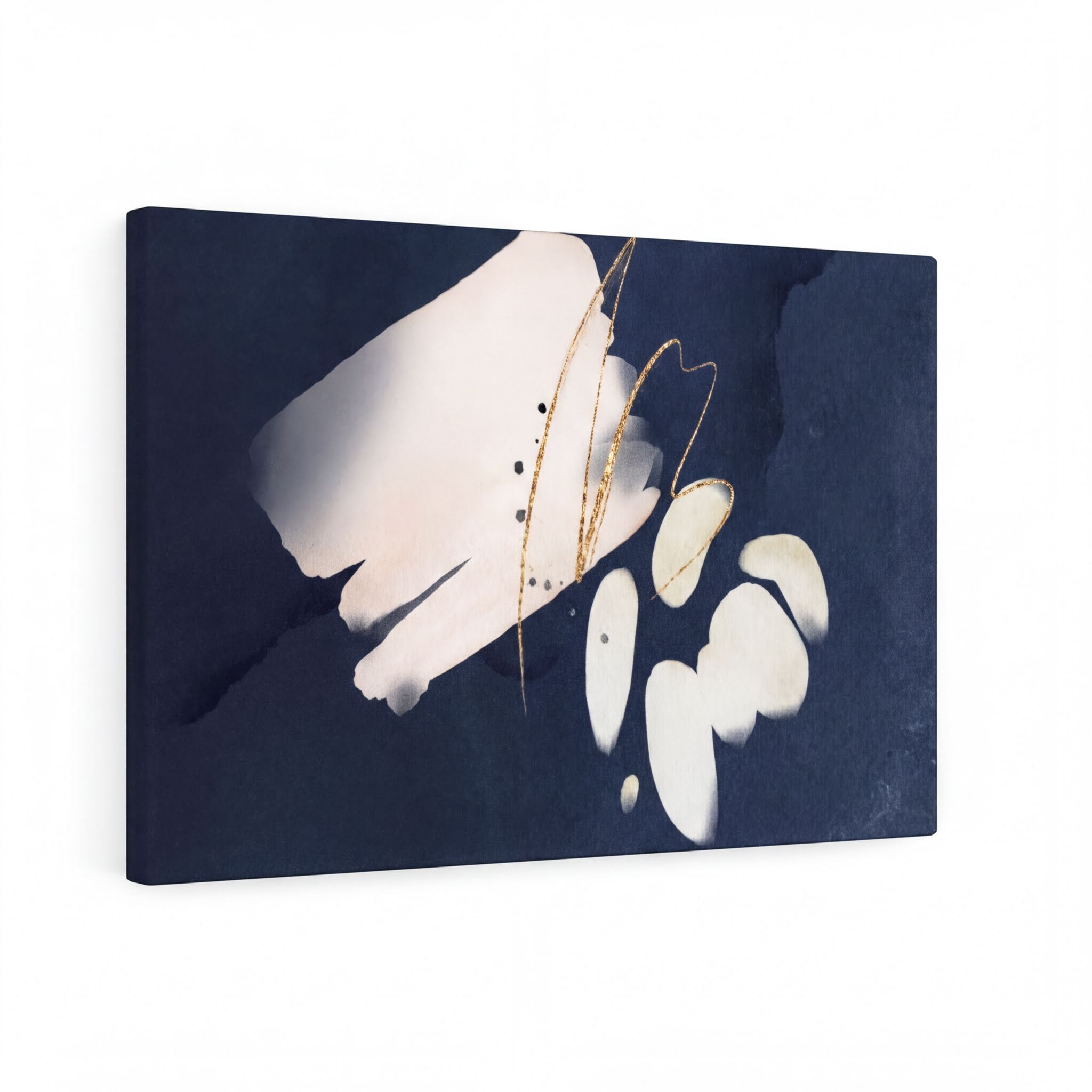 Navy blue, cream and white abstract wall canvas art displayed on a living room gallery wall