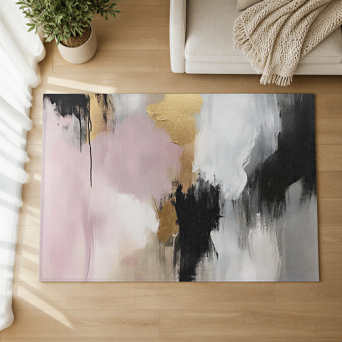 a large abstract painting with a mix of pink, black, and white colors, displayed on a rug on a wooden floor.