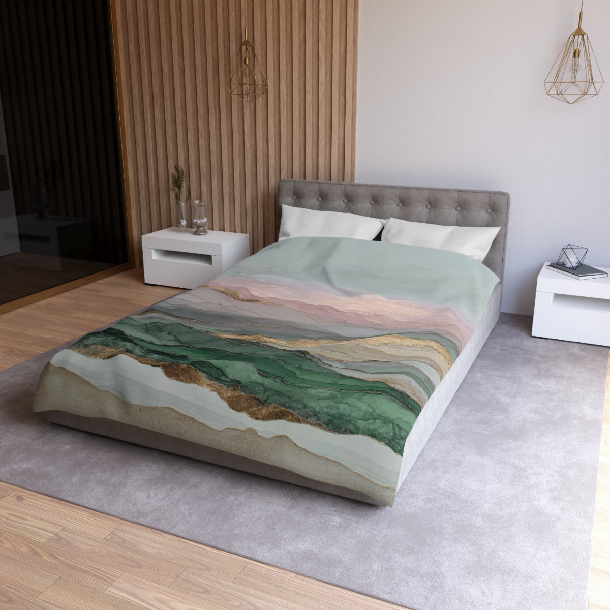 a modern bedroom with a large bed, a nightstand, and a wooden wall. The bed has a colorful, abstract-patterned comforter that resembles a mountain landscape. The room has a neutral color scheme with white walls and a gray carpet.