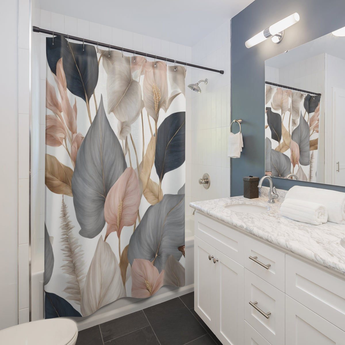 a modern bathroom with a white vanity and a shower curtain featuring a floral pattern in shades of pink, blue, and gray.