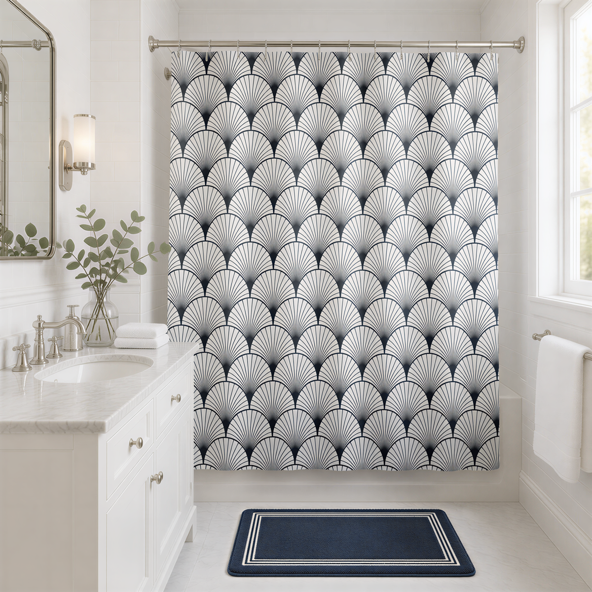 a bathroom with a white vanity and a black and white patterned shower curtain.
