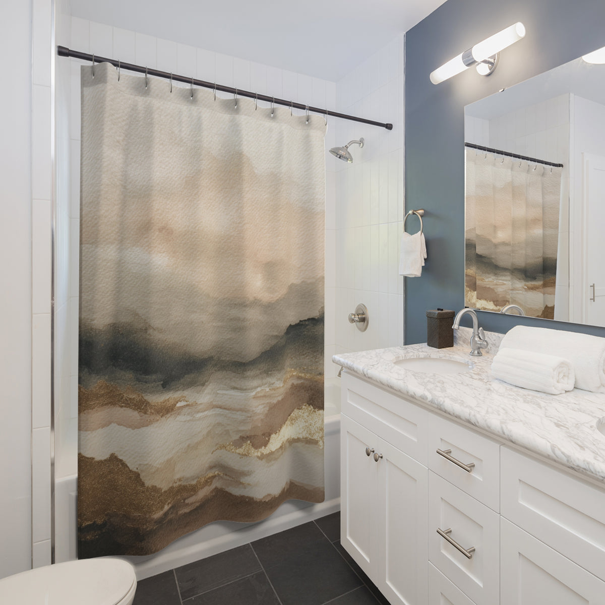 a modern bathroom with a white vanity, a shower curtain featuring a landscape design, and a mirror above the vanity.