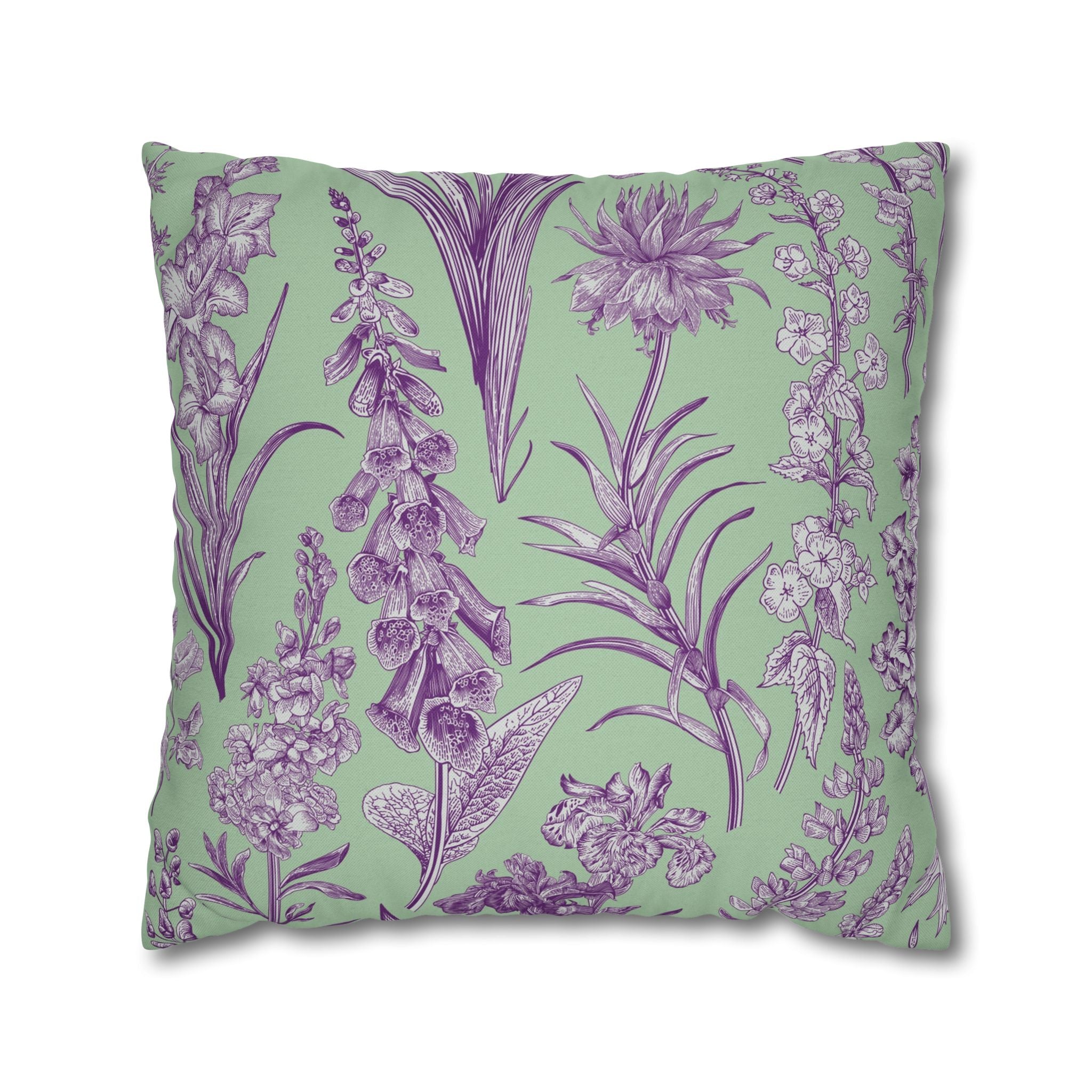 a square throw pillow with a repeating pattern of purple flowers and leaves on a light green background.