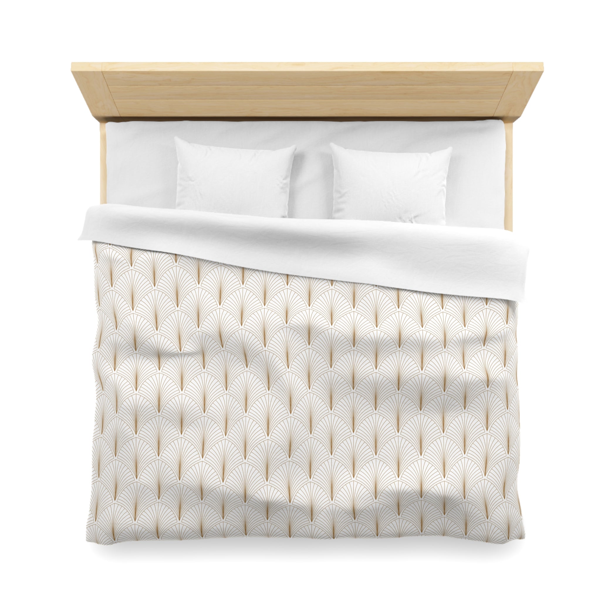 A neatly made bed with a white comforter and pillows, featuring a patterned design in shades of white and gold.