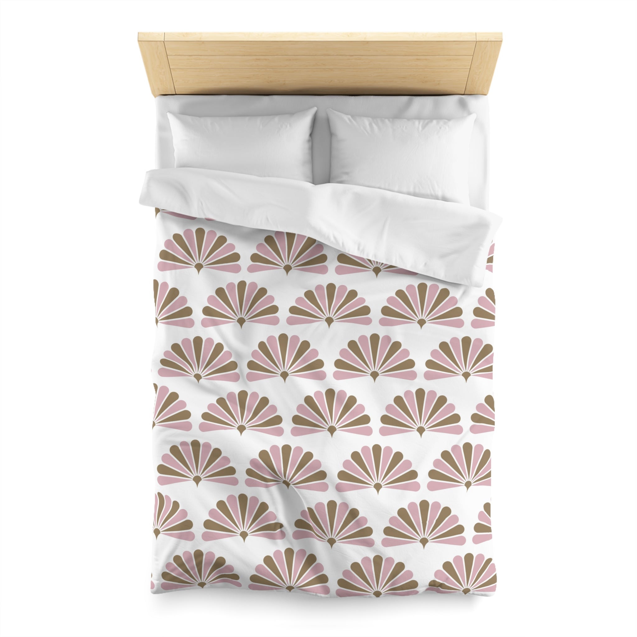a neatly made bed with a white comforter and pillows, featuring a repeating pattern of pink and brown fan-like designs.