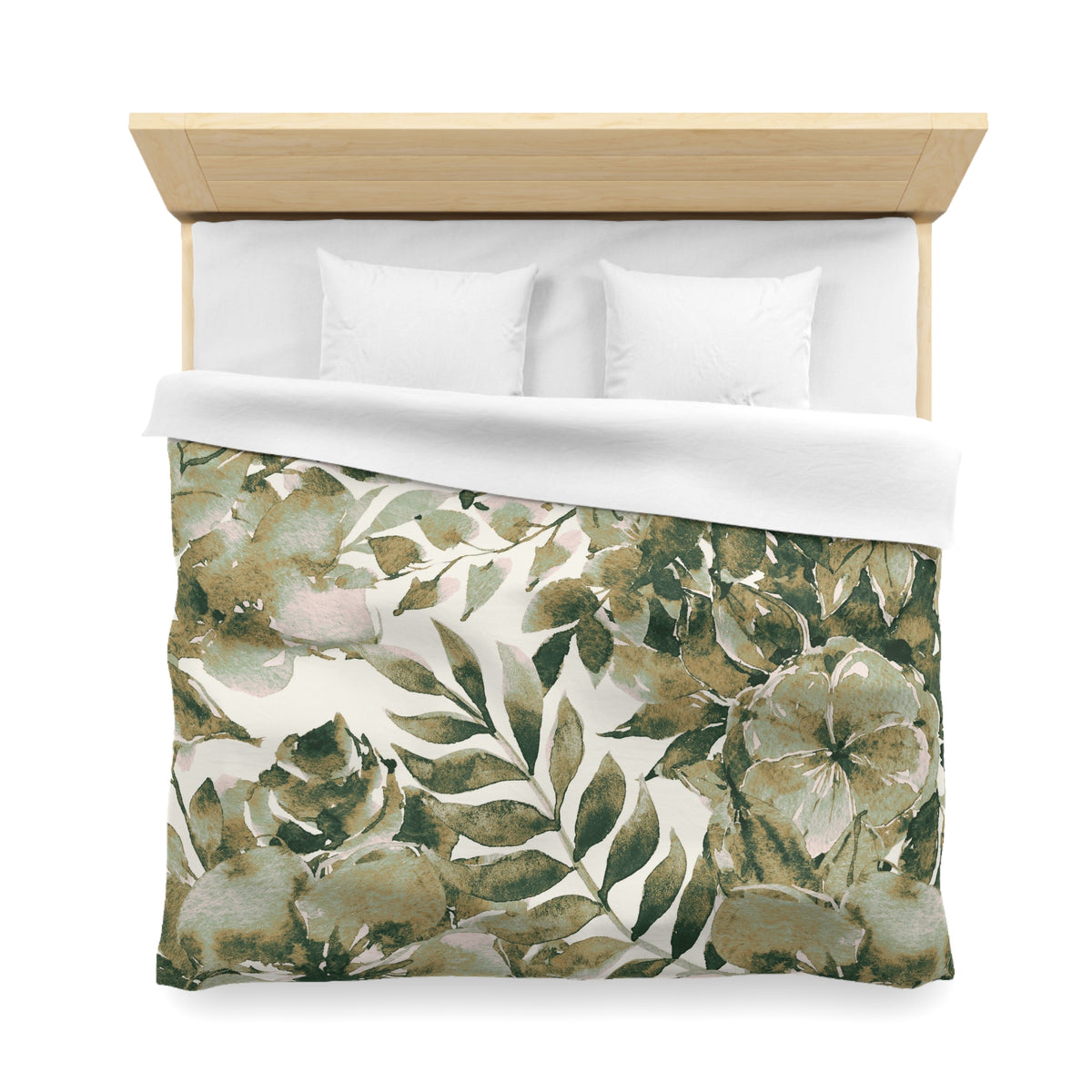 a neatly made bed with a floral print duvet cover and two white pillows.
