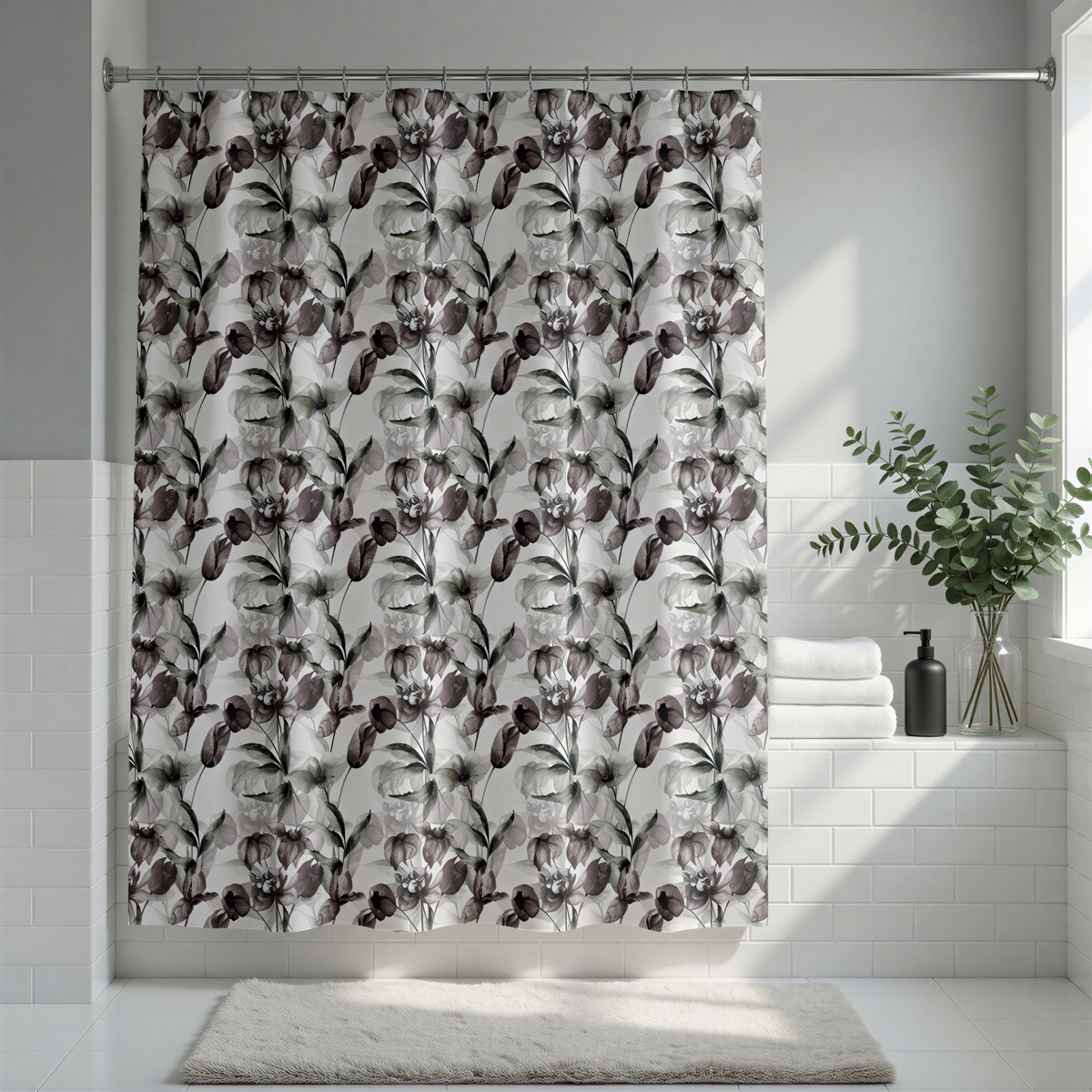 a bathroom with a shower curtain adorned with a floral pattern. The shower curtain is hanging from a rod, and there is a white rug on the floor beneath it. A potted plant is placed on the windowsill, and a bottle is visible on the windowsill as well.