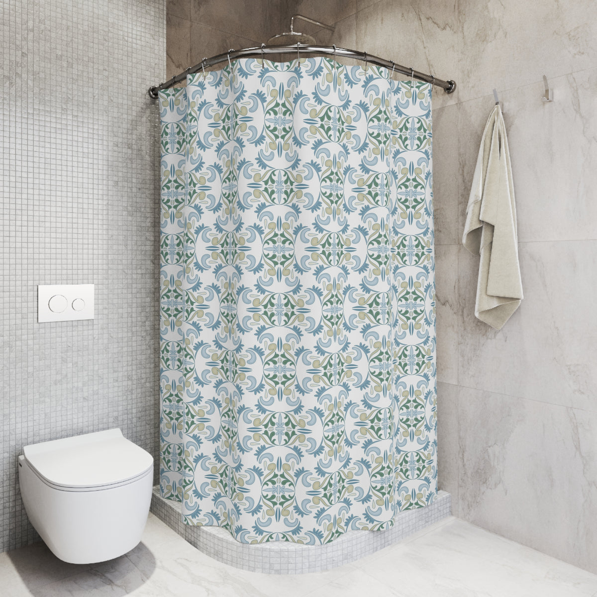 a bathroom with a shower curtain featuring a floral pattern in shades of blue and green. The shower is located next to a toilet, and there is a towel hanging on the wall.